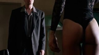 Brunette Lena Olin in lingerie shows off her tiny tits