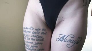 Two inked lezzies enjoying strapon dildo